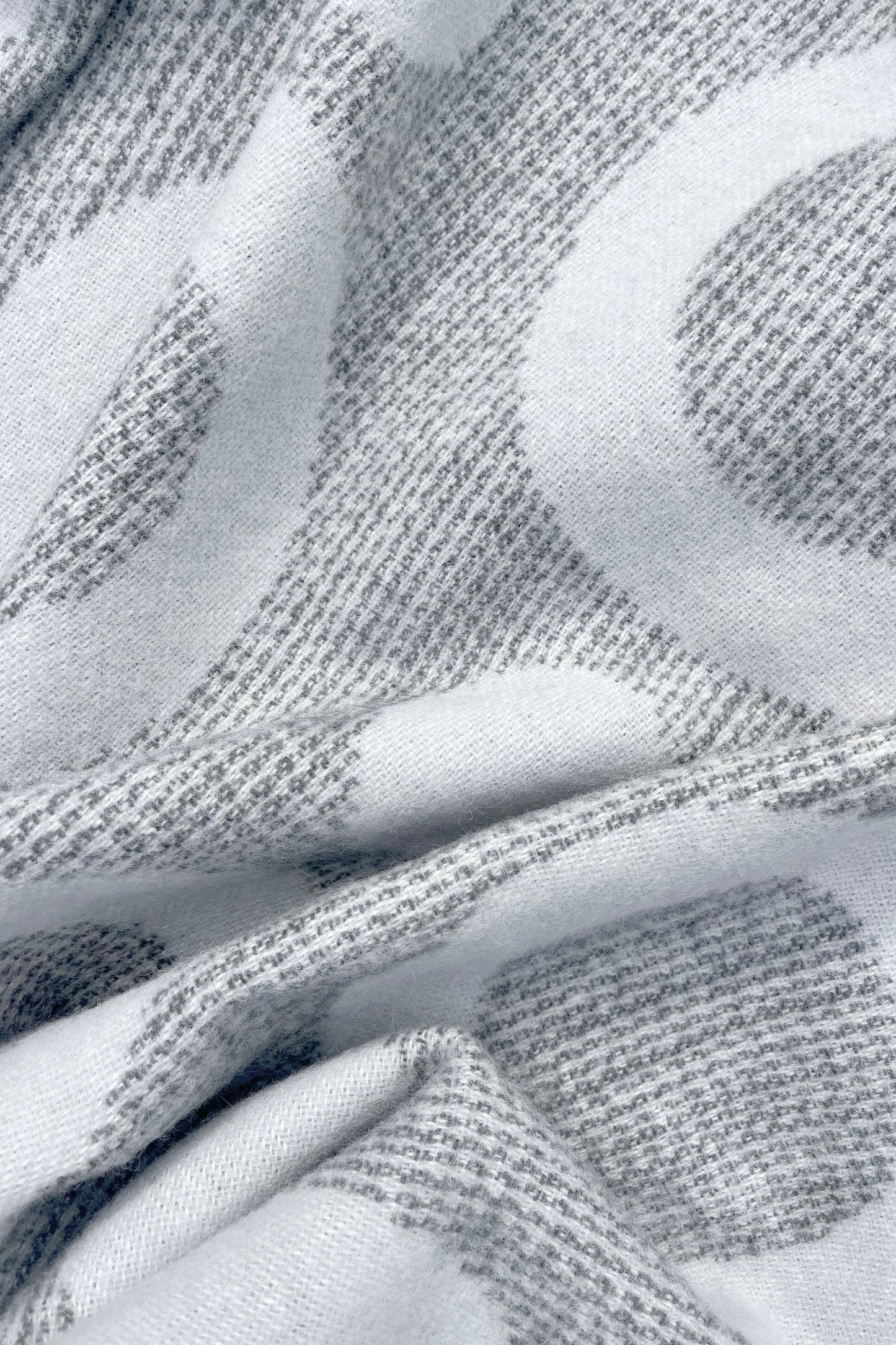 Moooi Umbrella Squid Ullpledd Stone, en del av kategorien Pledd - At Home Interiør